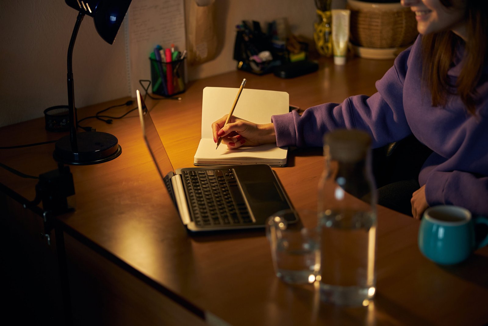 young cheerful confident happy freelancer woman is working laptop home evening scaled